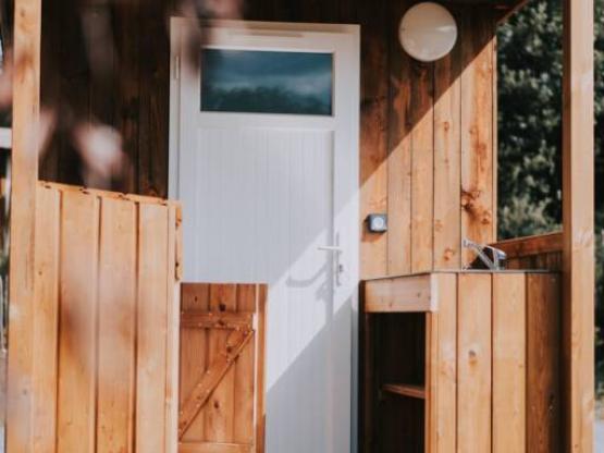 PREMIUM  PITCH ( tent/caravan/campervan) with private lavatory, fridge, sink and plancha