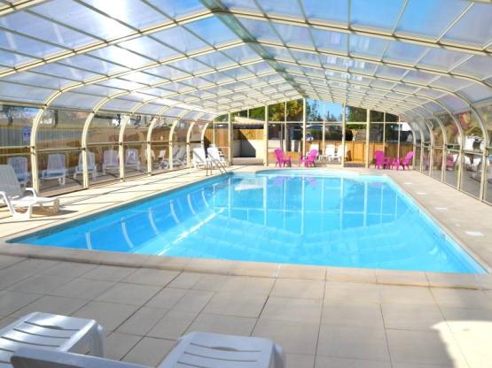 Mobilhome SESAME 40m² avec TELEVISION 2 chambres terrasse couverte