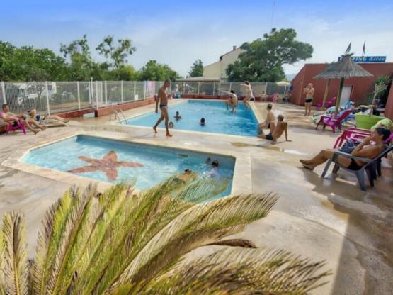 Cottage Premium 34m² - (3 chambres) - terrasse couverte + Climatisation + TV + LV + linge de maison