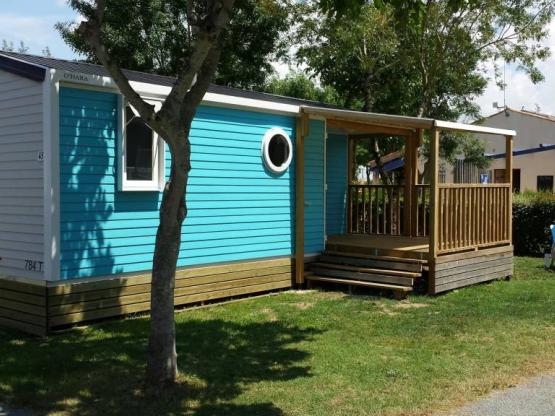 Mobilhome  EVASION: 2 chambres, 27.5m², terrasse couverte, climatisation.