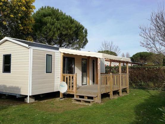 Mobil home Elégant 3 / 33m² - 3 chambres / locatif de 0 à 5 ans / terrasse bois couverte