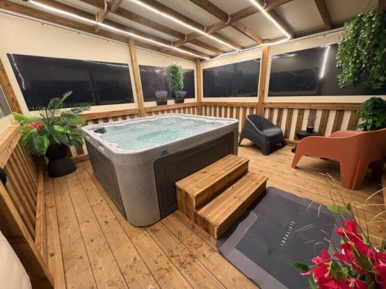 Cottage Premium 40m² - Spa privé - vue nature  - 3 chambres - 2 salles de bain - borne de recharge